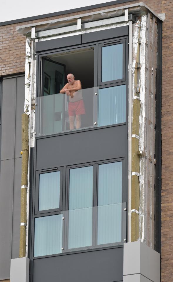  Cladding has been stripped from a new tower block in Wythenshaw