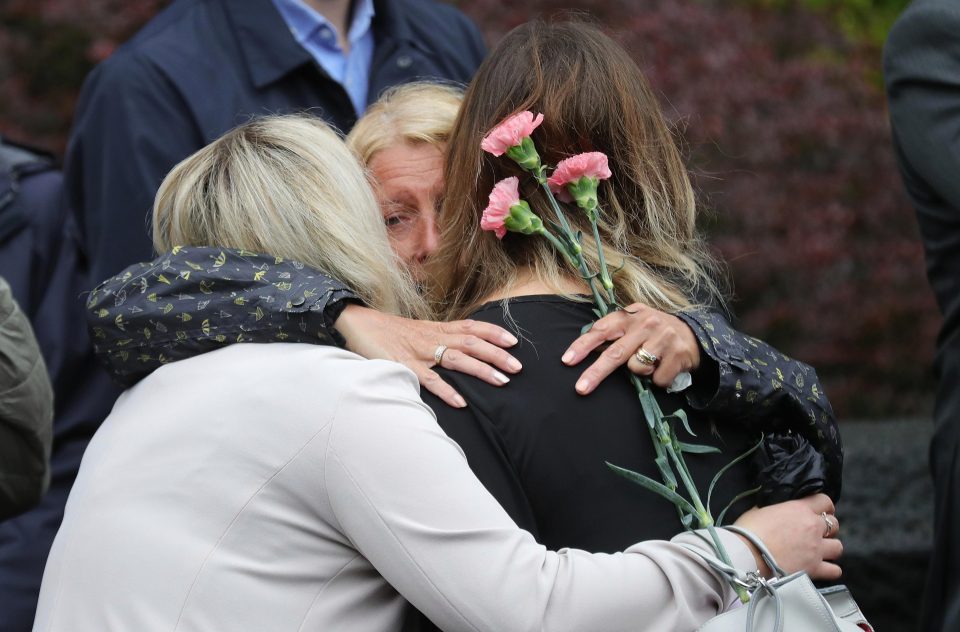  Mourners consoled each other outside the church following Alison's funeral