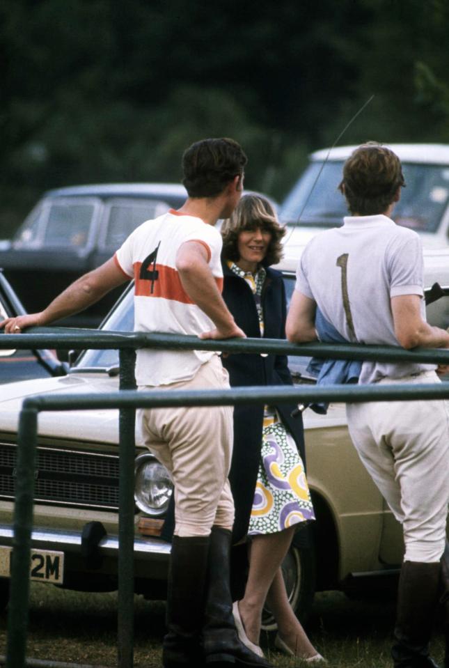  Prince Charles chats to Camilla at a polo match