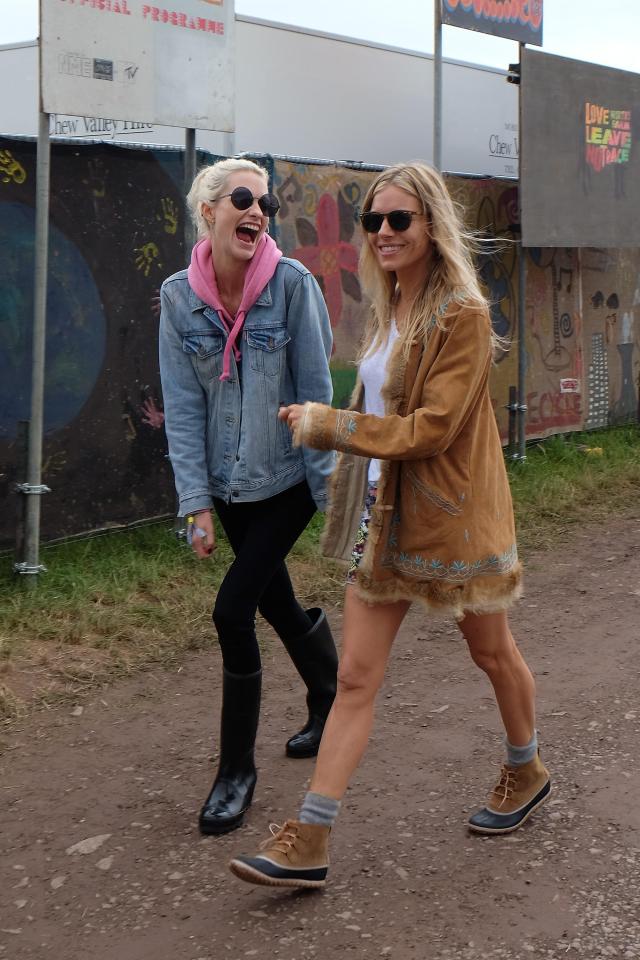  Sienna - pictured with pal Poppy Delevingne - headed back to a private Winnebego with Brad