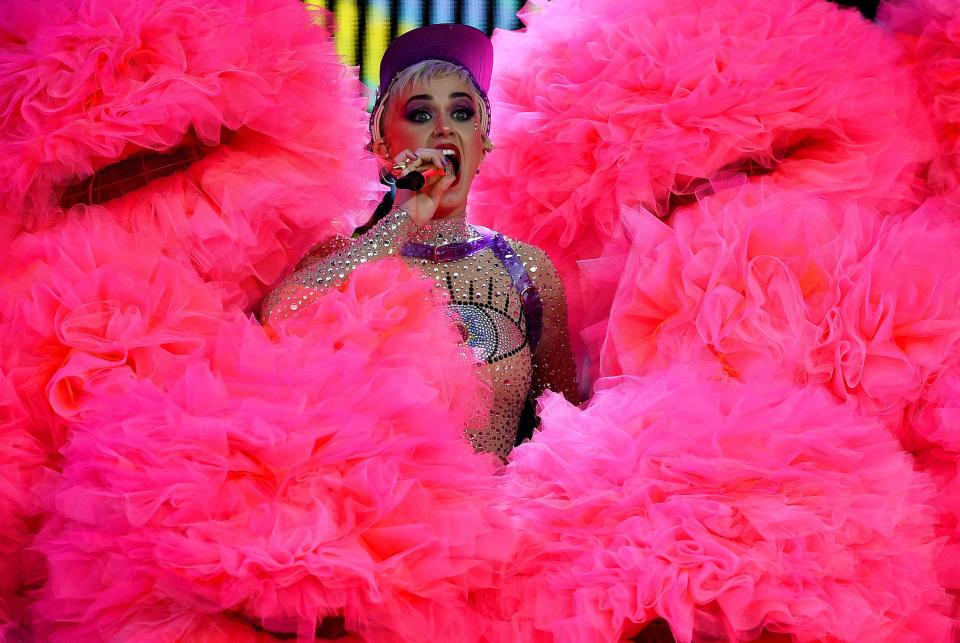  Katy was almost engulfed by her purple pom poms