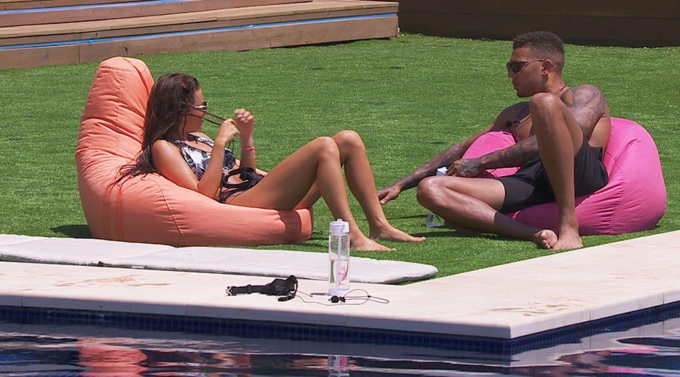  Islanders Amber and Simon unwind on the colourful beanbags by the pool