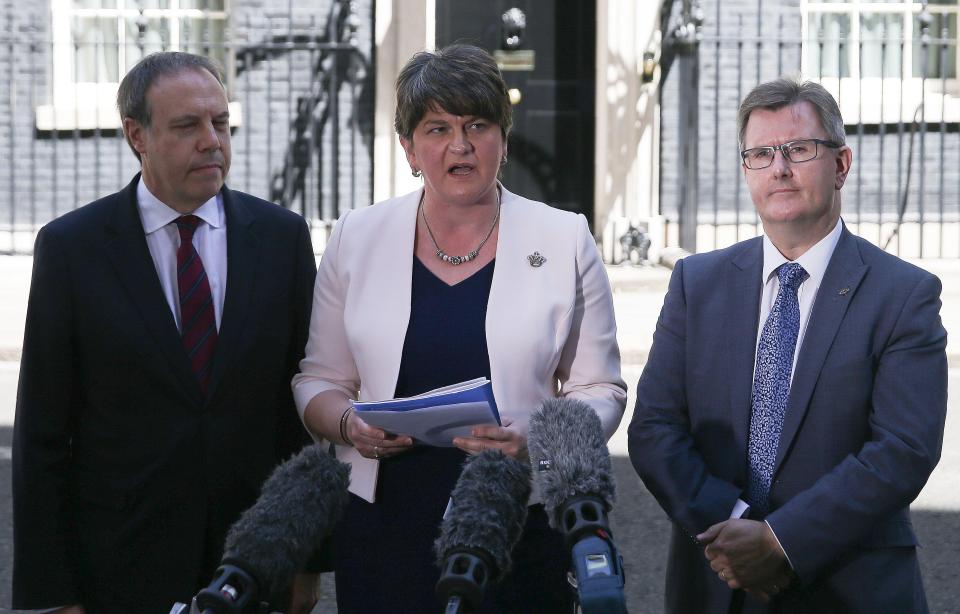  (left to right) DUP Deputy Leader Nigel Dodds, Leader Arlene Foster, Chief Whip Jeffrey Donaldson