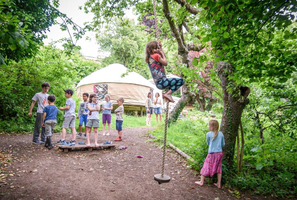  Children playing at new hipster school The Green House Education in Bath, Somerset