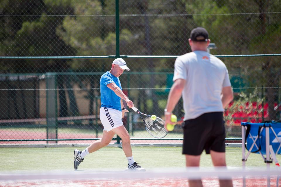  Sun man Jim Holgate takes a tennis class with Mark Petchey at a Croatian holiday resort