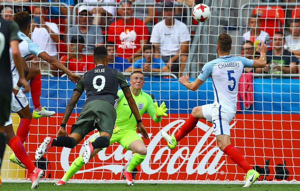  Davie Selke leaps to put Germany into the lead