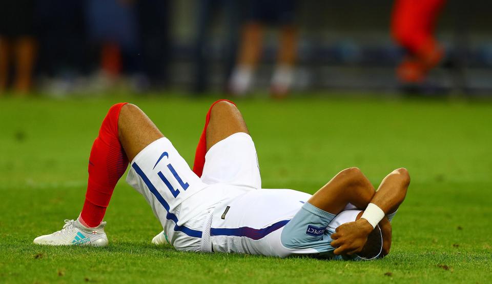  Redmond crumpled to the floor after the crucial miss sent England home