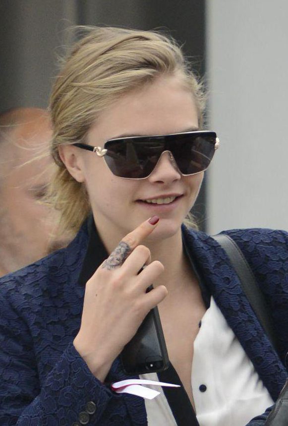  Cara Delevingne was slammed for her finger tattoo, which the pair said was too small and sure to smudge over time