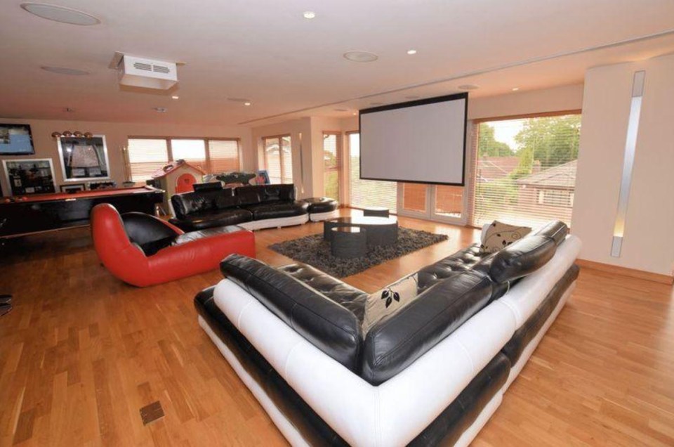 Amir Khan’s lounge includes a home cinema system and his own pool table