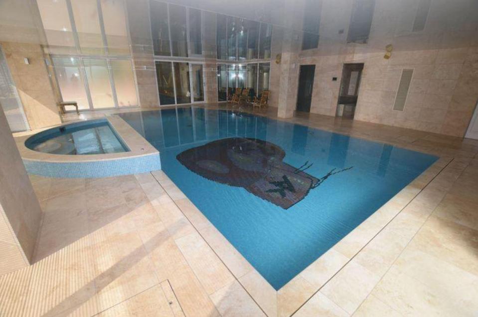  Amir's house in Bolton boasts a huge heated swimming pool and a sauna