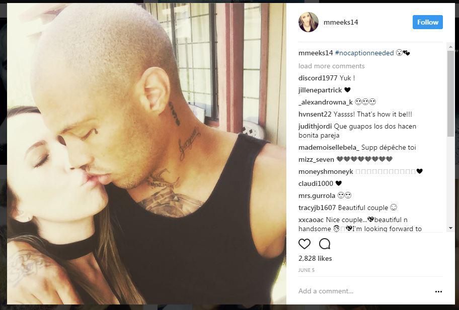  Meeks kissing Melissa, his wife of eight years