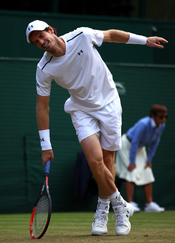  Andy Murray looks in pain on Centre Court today