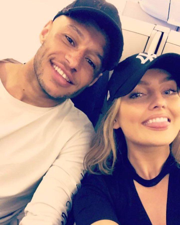  Perrie Edwards and Alex Oxlade-Chamberlain shared romantic snaps of themselves on holiday in a mystery exotic location on  Instagram