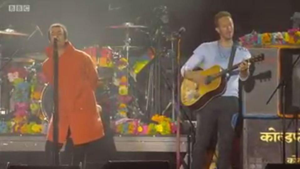  Liam Gallagher and Chris Martin put the past behind them at One Love Manchester