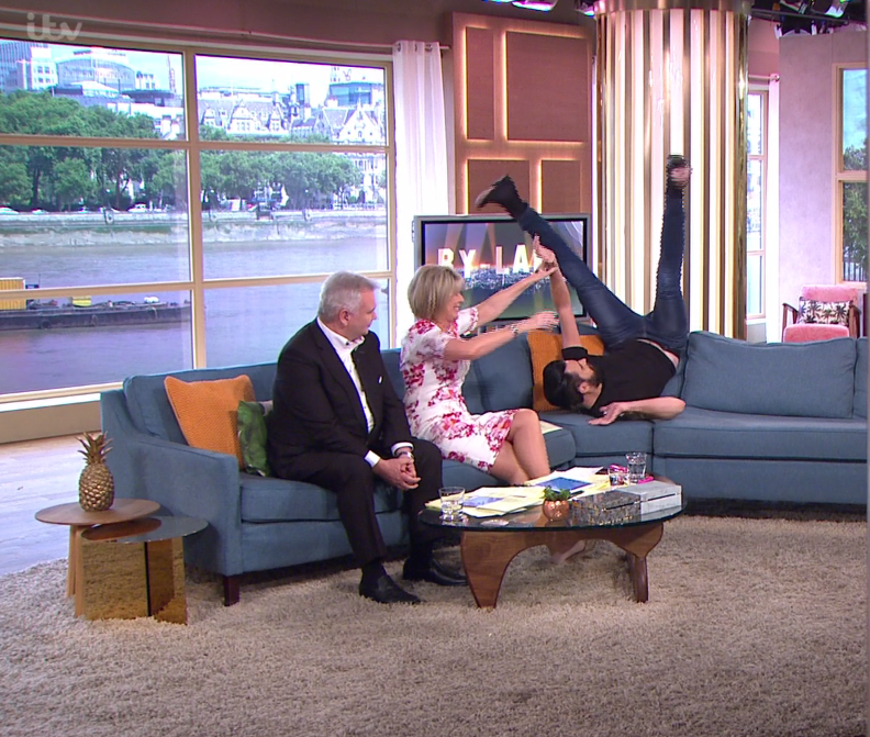  Rylan Clark-Neal attempted to recreate Naomi Campbell's yoga moves but fell off the sofa