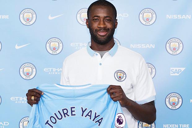 Yaya Toure has extended his stay at Manchester City for an eighth season after singing a new deal