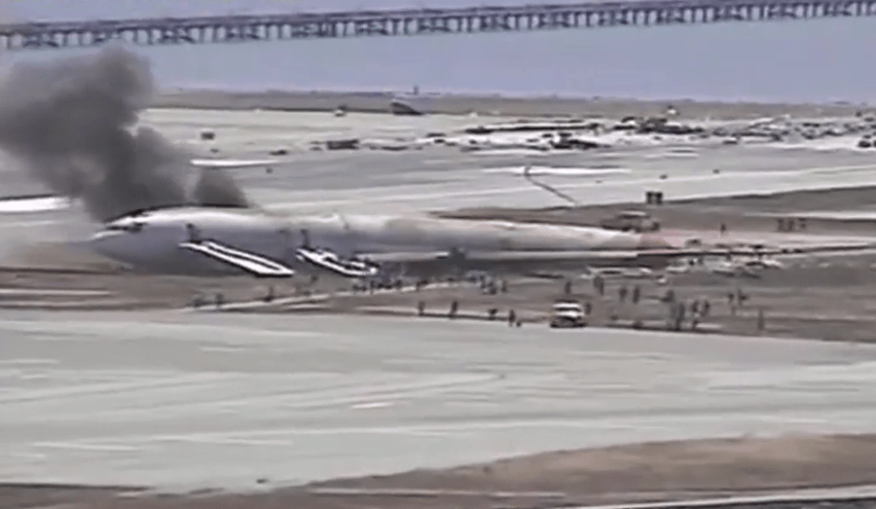 Terrified passengers can be seen fleeing the aircraft as it starts to burn 