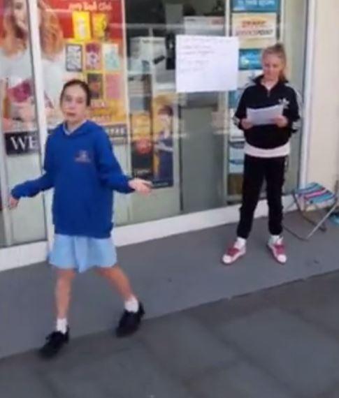  A schoolgirl busker has melted the hearts of passersby with her pitch-perfect rendition of songs from 'Annie'