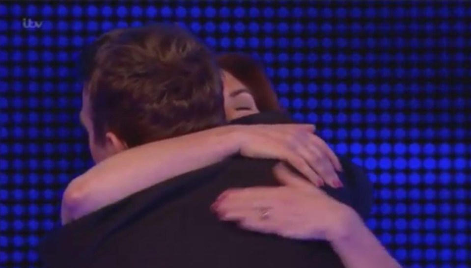 Bradley hugs Renee after she wins the cash