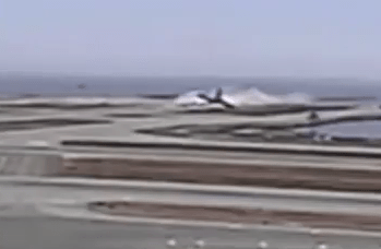 The Asiana Airlines jet can be seen crashing as it comes in to land 