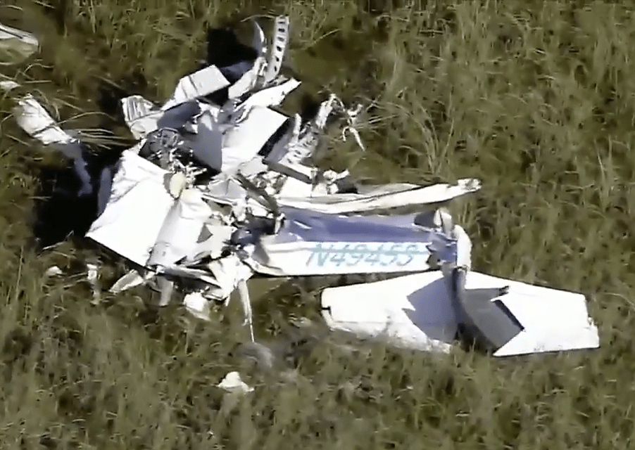  The Cessna's mangled wreckage can be seen in the swamp where it crashed