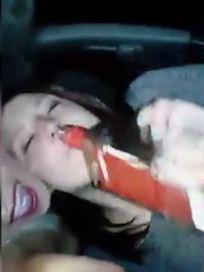 The clips appears to show the girls drinking spirits while in the car