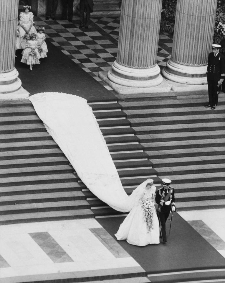  Wedding day... Princess Diana's wedding dress featured an incredible 25ft train