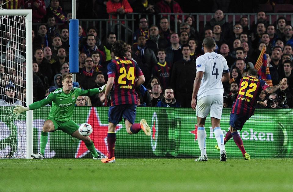  Dani Alves scores against Manchester City in a 2014 Champions League tie