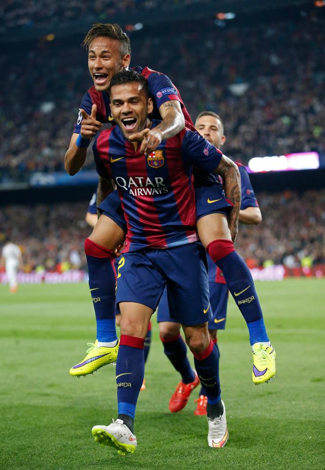  Dani Alves celebrates a goal at Barcelona along with good pal Neymar