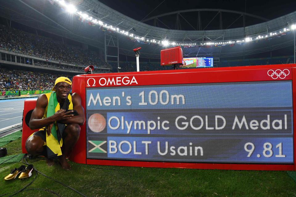  Usain Bolt celebrates after he won the Men's 100m Final during the athletics event at the Rio 2016