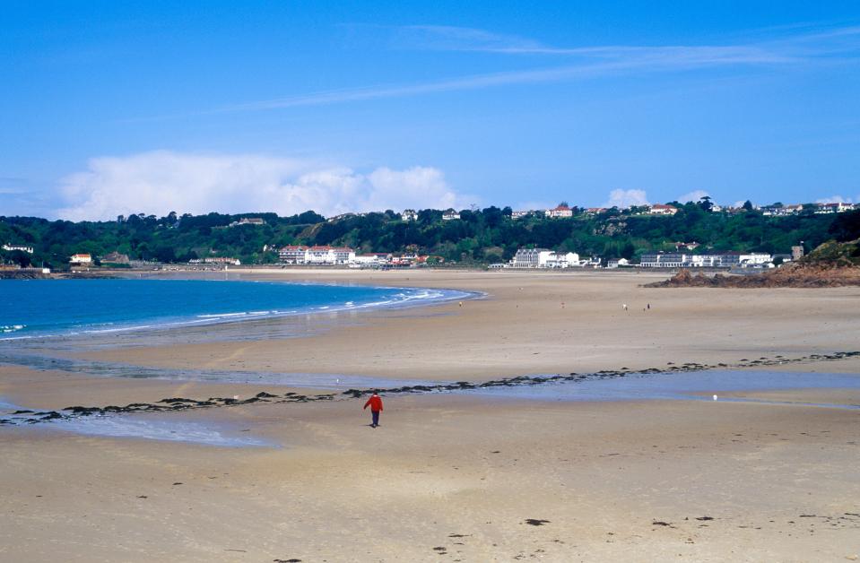  St Brelade's Bay Beach, Jersey, offers trampolining and volleyball