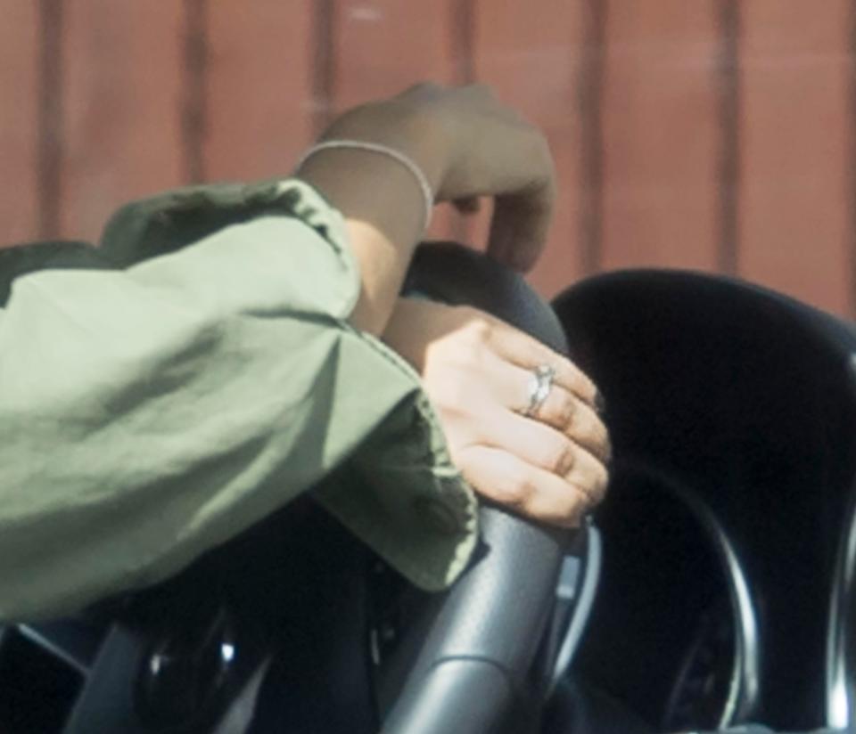 She was seen wearing her wedding ring when leaving her house last month 