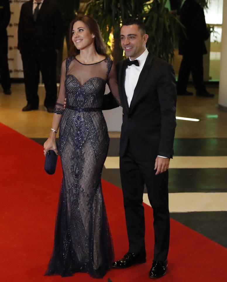 Xavi Hernandez and wife Nuria Cunillera attend the wedding of Lionel Messi