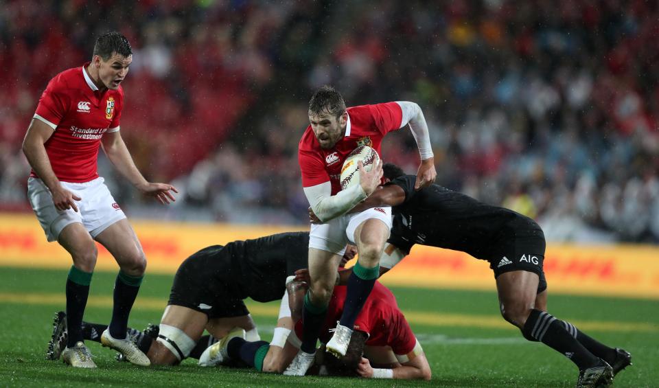  Elliot Daly tries to break through the All Blacks defence