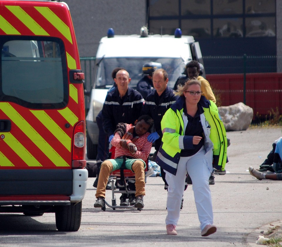 Riot police in Calais have stepped in to break up clashes between around 100 African migrants