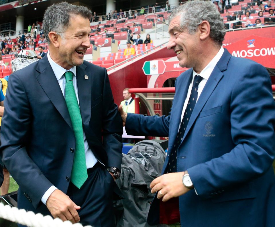  All smiles before the game as Osorio greets Portugal counterpart Fernando Santos