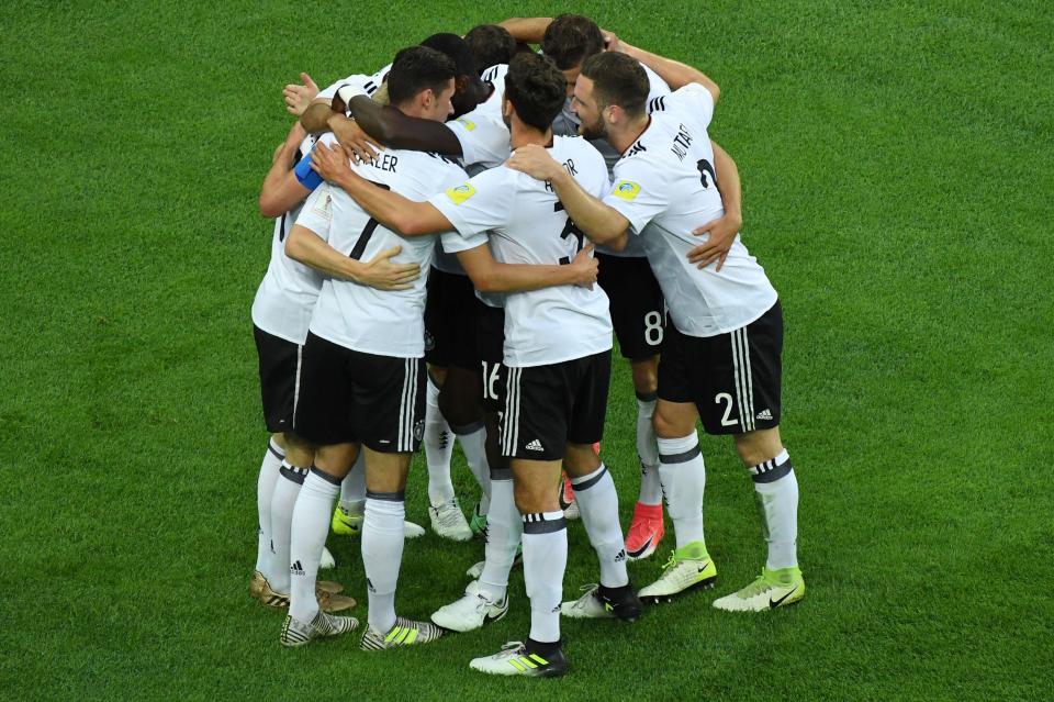  The 28-year-old celebrates with his team-mates after he netted the opener in the Confederations Cup final