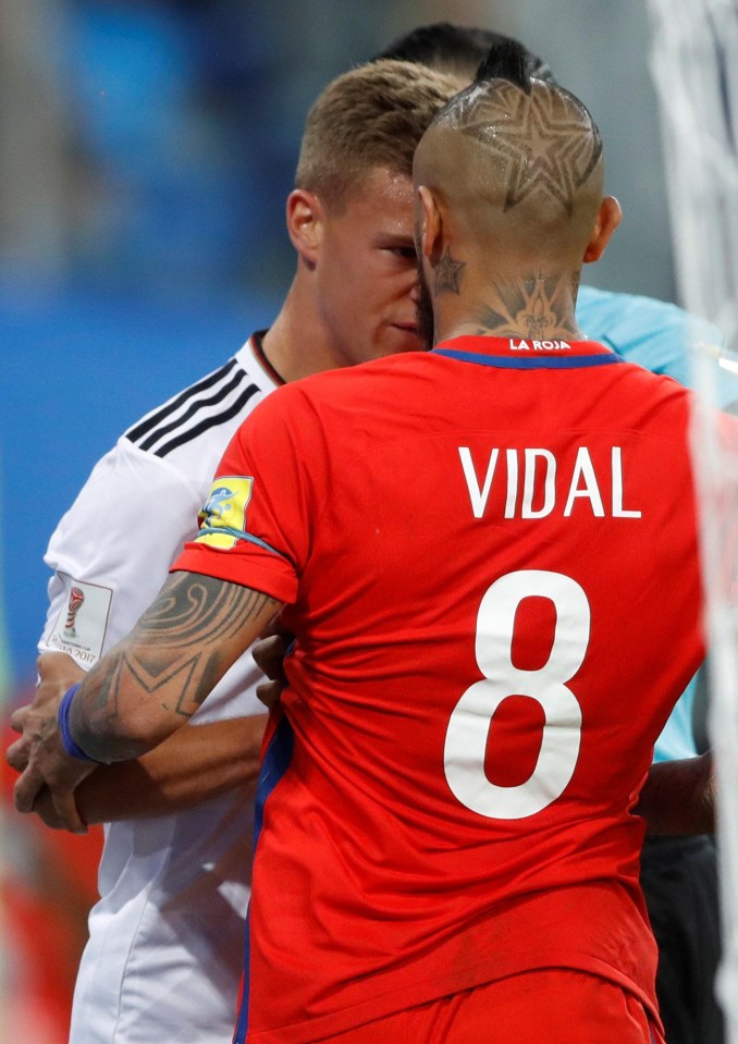 Bayern Munich team-mates Joshua Kimmich and Arturo Vidal clash in the second of the Confederations Cup clash