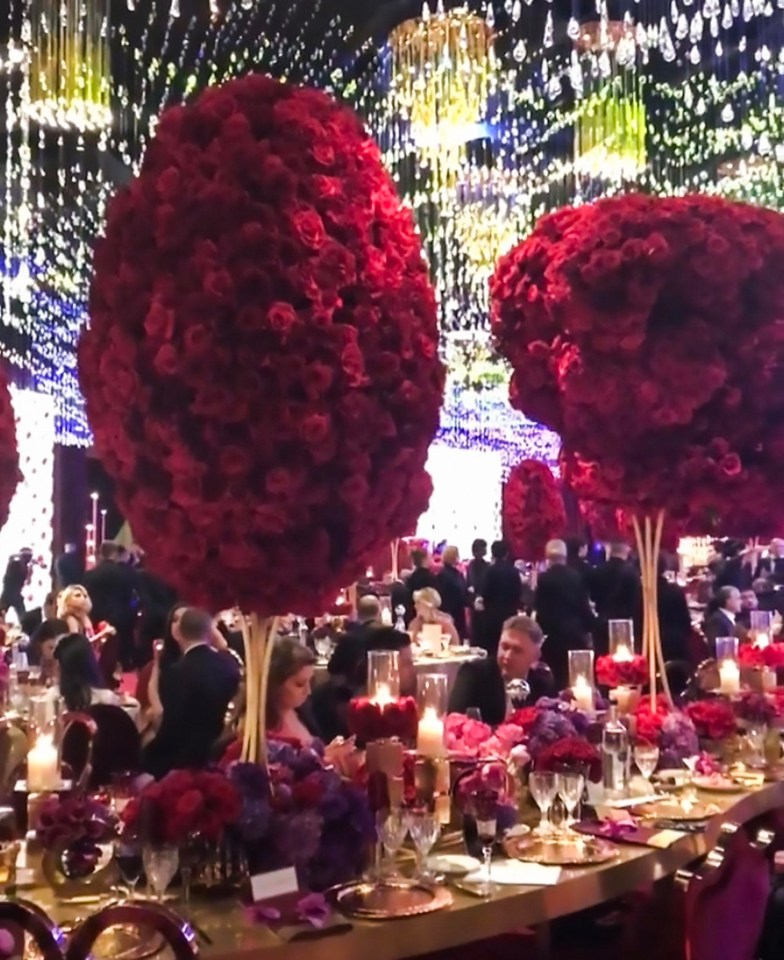 Towering table decorations of pink, purple and green blooms were the centrepieces of the night