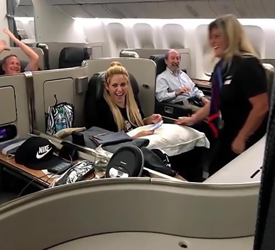  The Colombian singer was all smiles as the stewardess serenaded her with her own hit