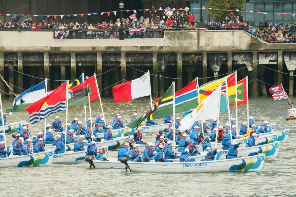  The Sea Cadets flying flags of the British Commonwealth, part of the one thousand vessel Queen Elizabeth II Diamond Jubilee Pageant celebrations on the River Thames