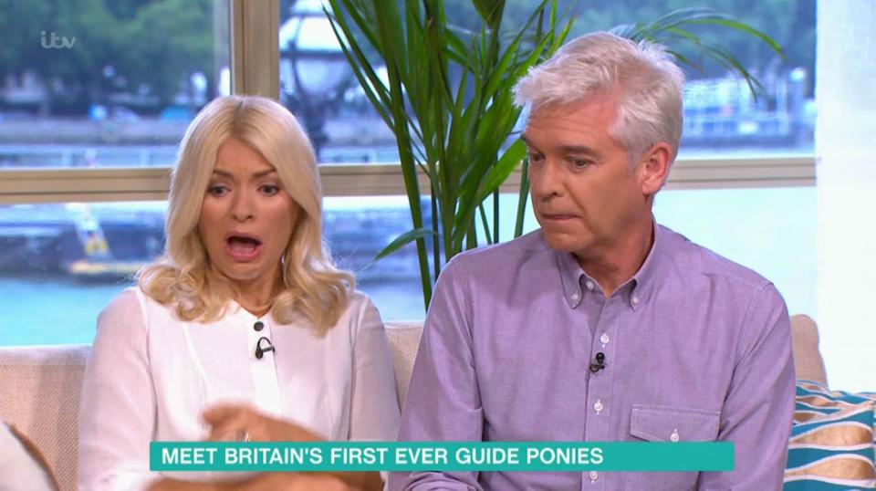  Holly reacted with horror as the pony pooped live on air