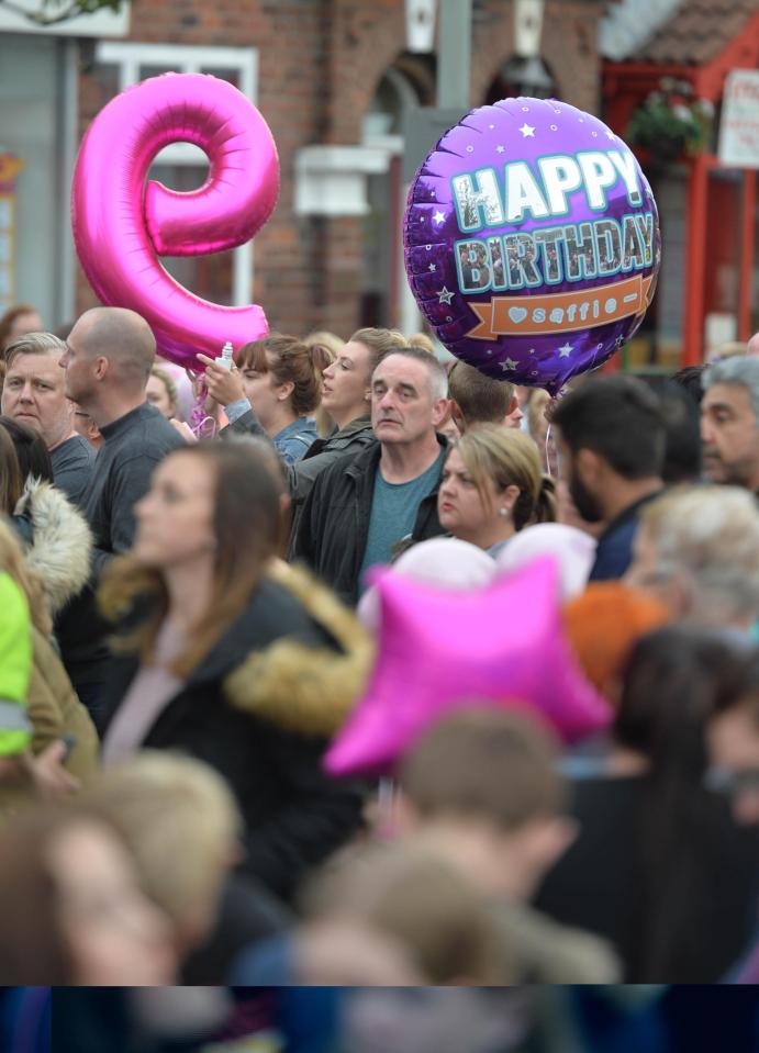  Hundreds of people gathered to release balloons into the air