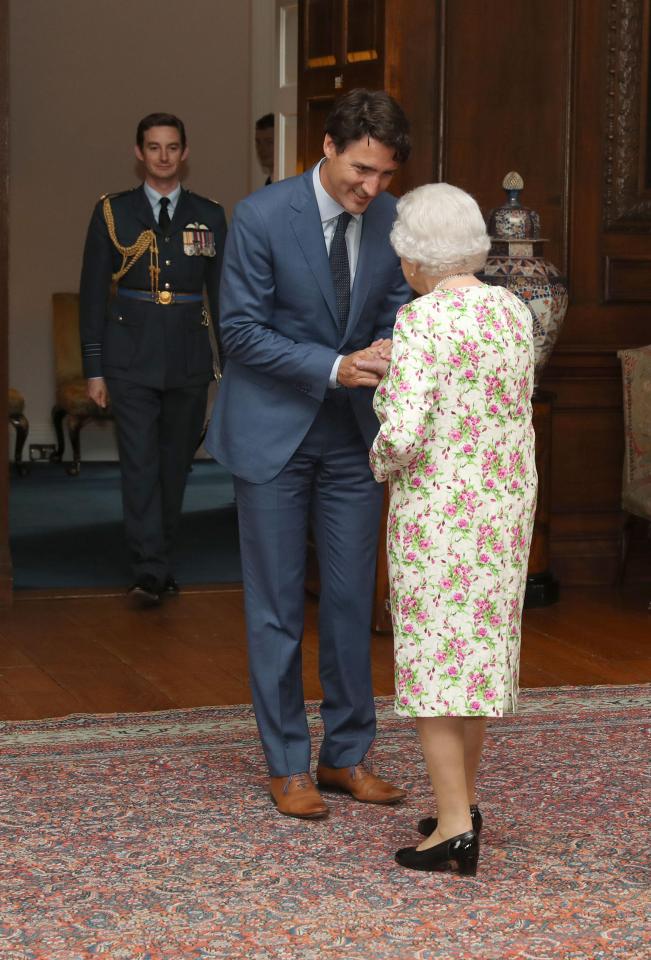  Queen Elizabeth II greets Canadian Prime Minister Justin Trudeau during an audience at the Palace of Holyroodhouse in Edinburgh