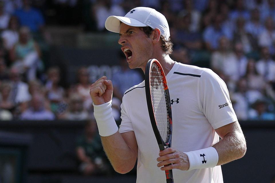  Andy Murray eased past Dustin Brown to reach the third round at Wimbledon