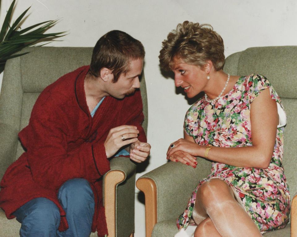  Princess Diana talking to a patient on one of the many visits to the Aids ward at Middlesex Hospital