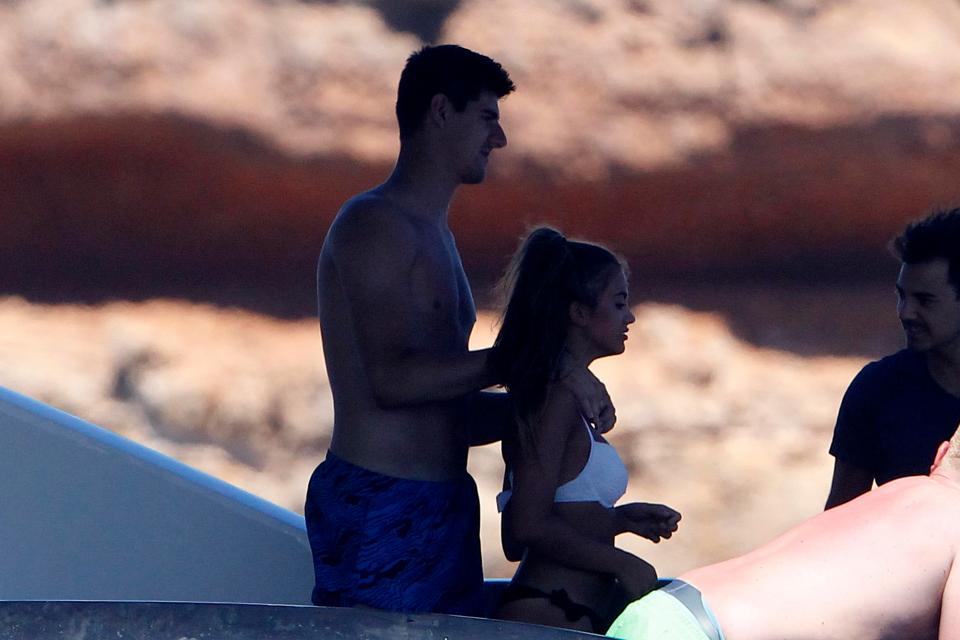 Courtois ensured that his mystery woman companion was in safe hands 