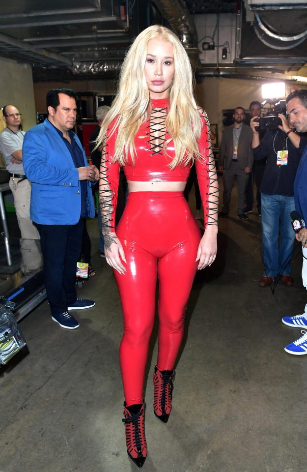  Iggy looked red hot in the unique red PVC outfit