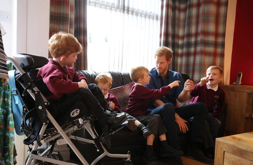  Harry visited as a group of volunteers transformed his garden into a safe play space as part of a charity project