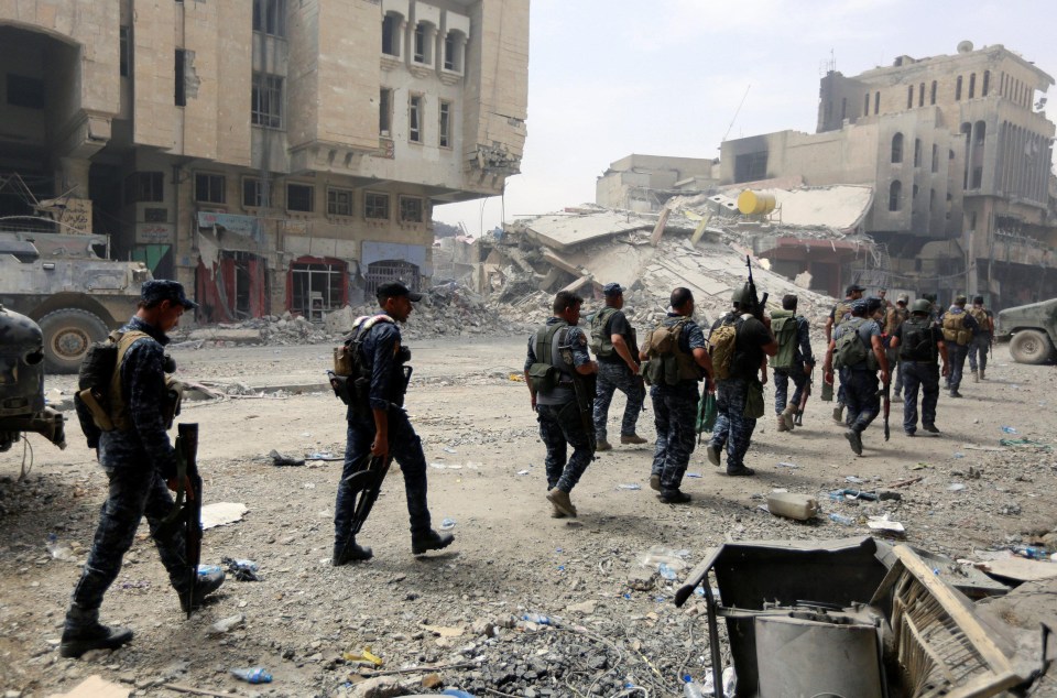 Members of Iraqi federal police begin moving in to the Old City where the final chapter of ISIS evil grip on Mosul is being played out